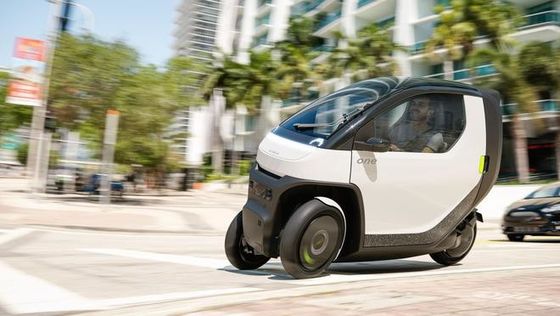 مینی EV car@ Nimbus One یک خودرو کمکت و شیب دار قادر به سرعت تا 50 مایل در ساعت با باتری برای رفت و آمد شهری